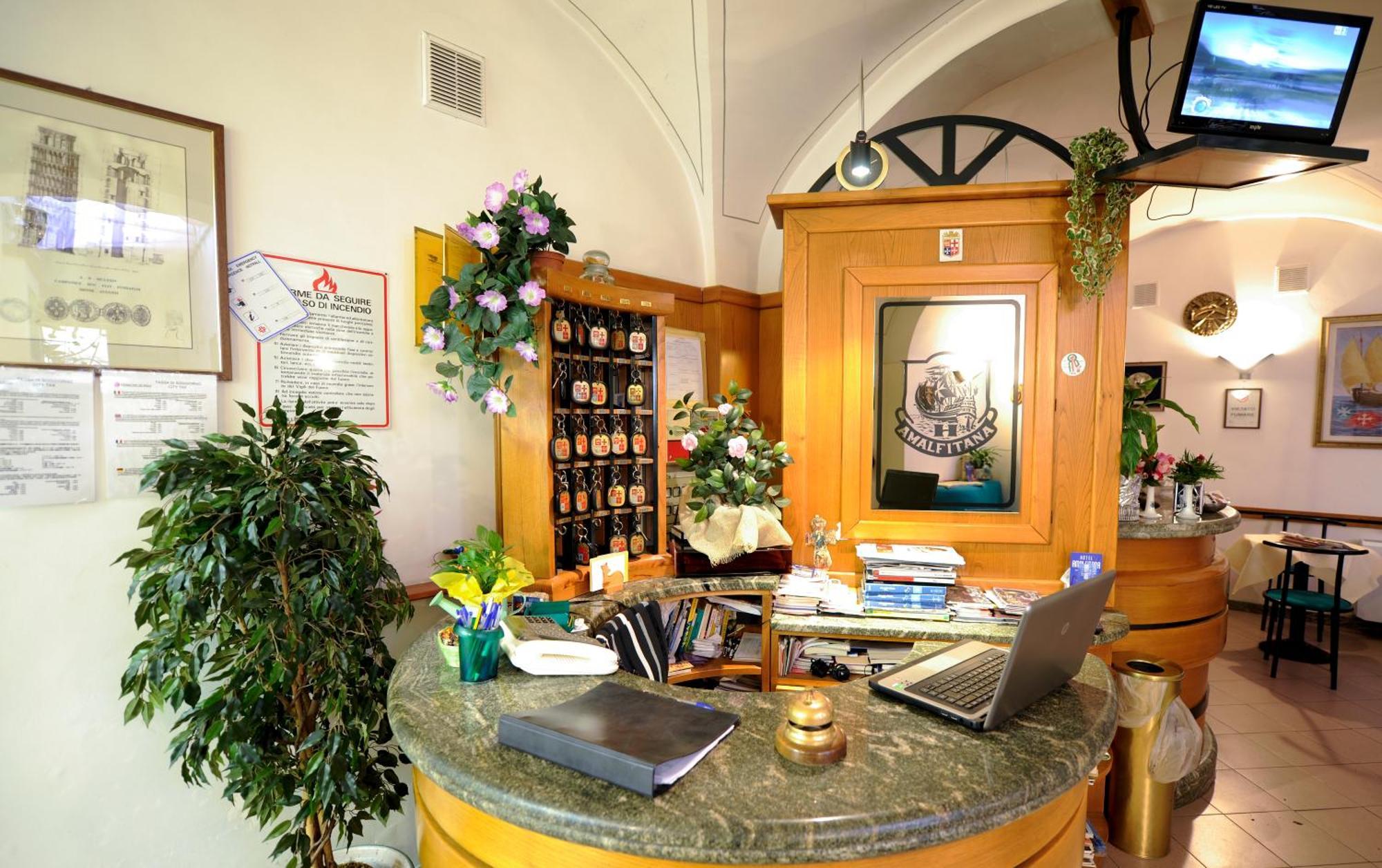 Hotel Amalfitana Пиза Экстерьер фото