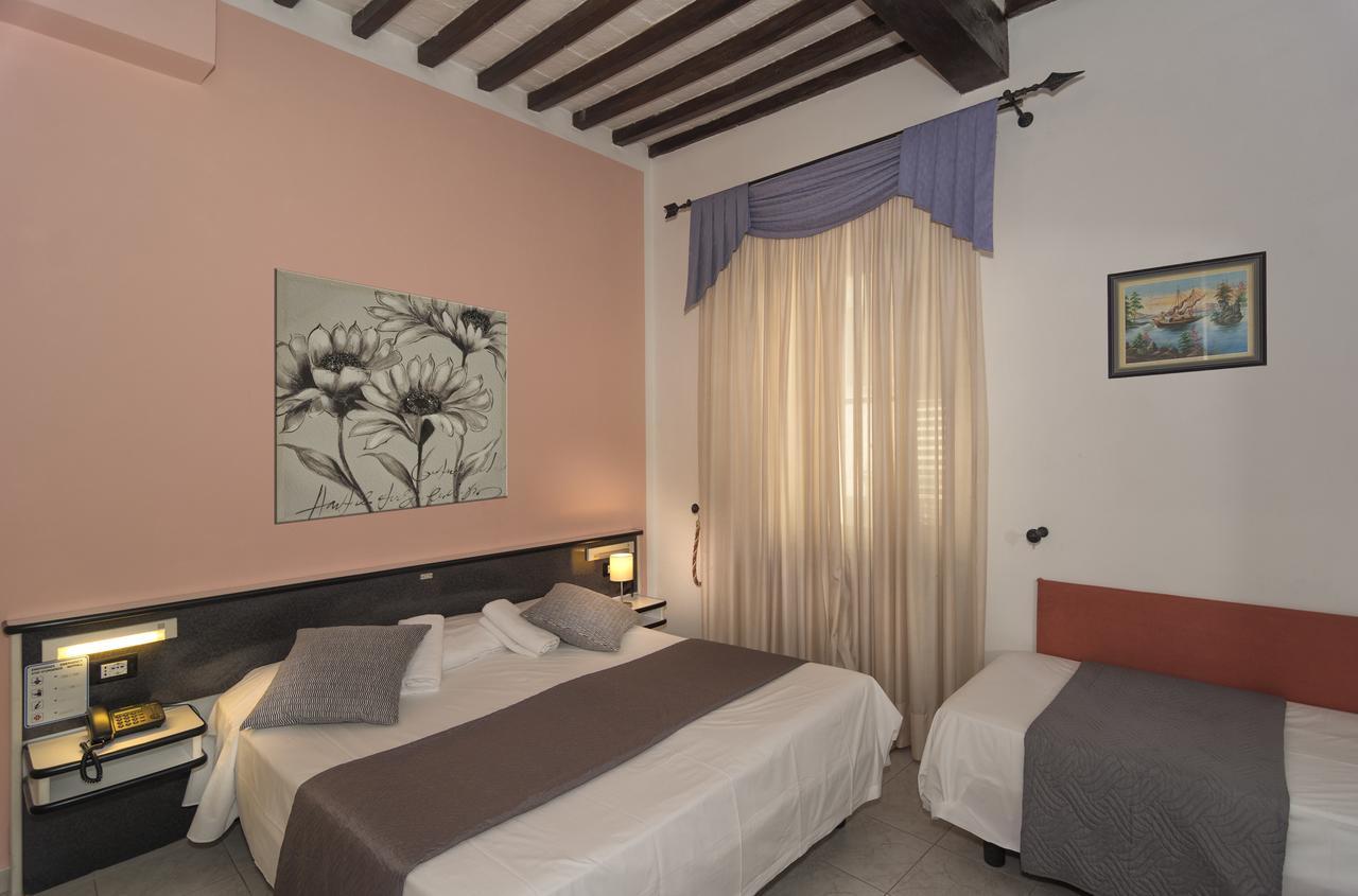 Hotel Amalfitana Пиза Экстерьер фото